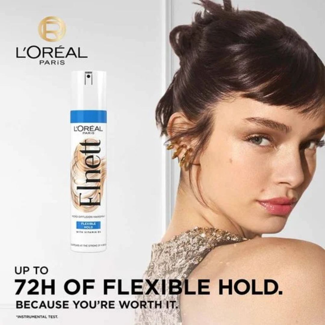 L'Oreal Paris Elnett hair spray with a model and brand logo on a gray background