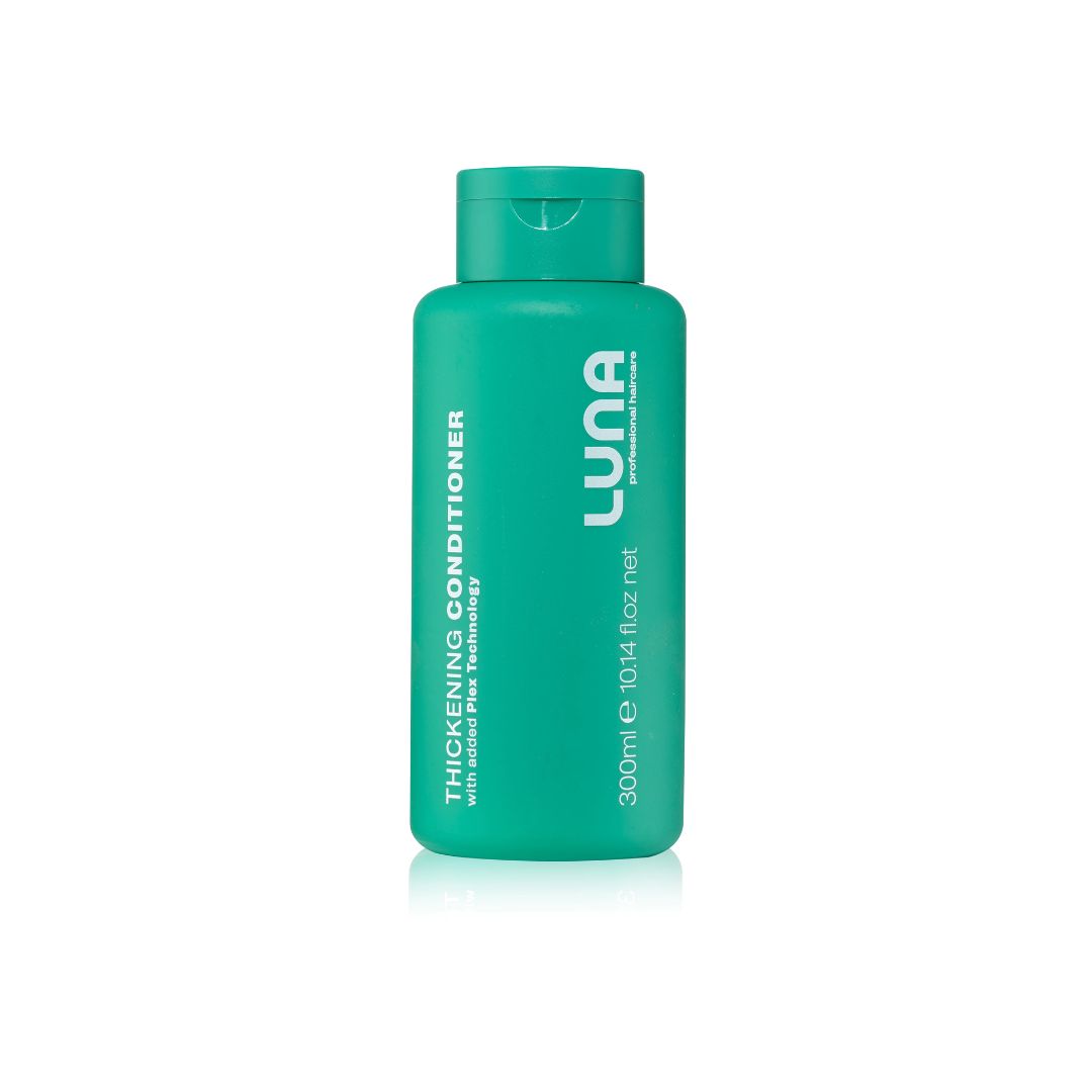 A 300ml bottle of LUNA Thickening Conditioner with natural pine technology, in a vibrant teal-green color with white text, shown on a clean white background with a subtle reflection.