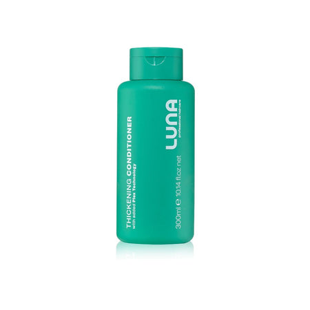 A 300ml bottle of LUNA Thickening Conditioner with natural pine technology, in a vibrant teal-green color with white text, shown on a clean white background with a subtle reflection.