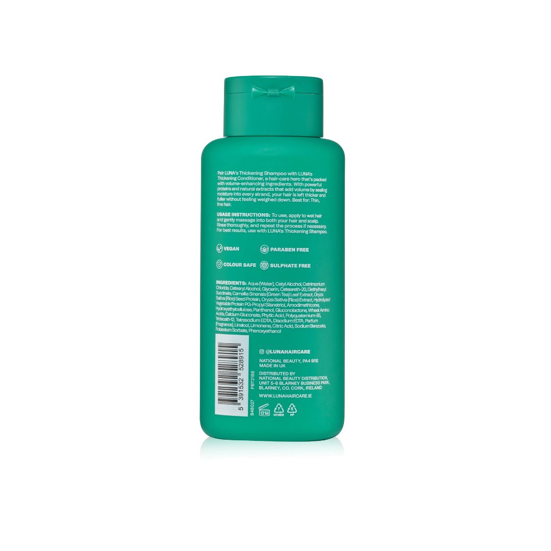 The back of a green plastic bottle with a matching green cap, showing product text, a barcode, and eco-label icons on a white background.