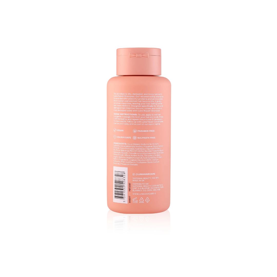 The back of a peach-colored plastic bottle with white text and a barcode, set against a plain white background with a soft reflection.