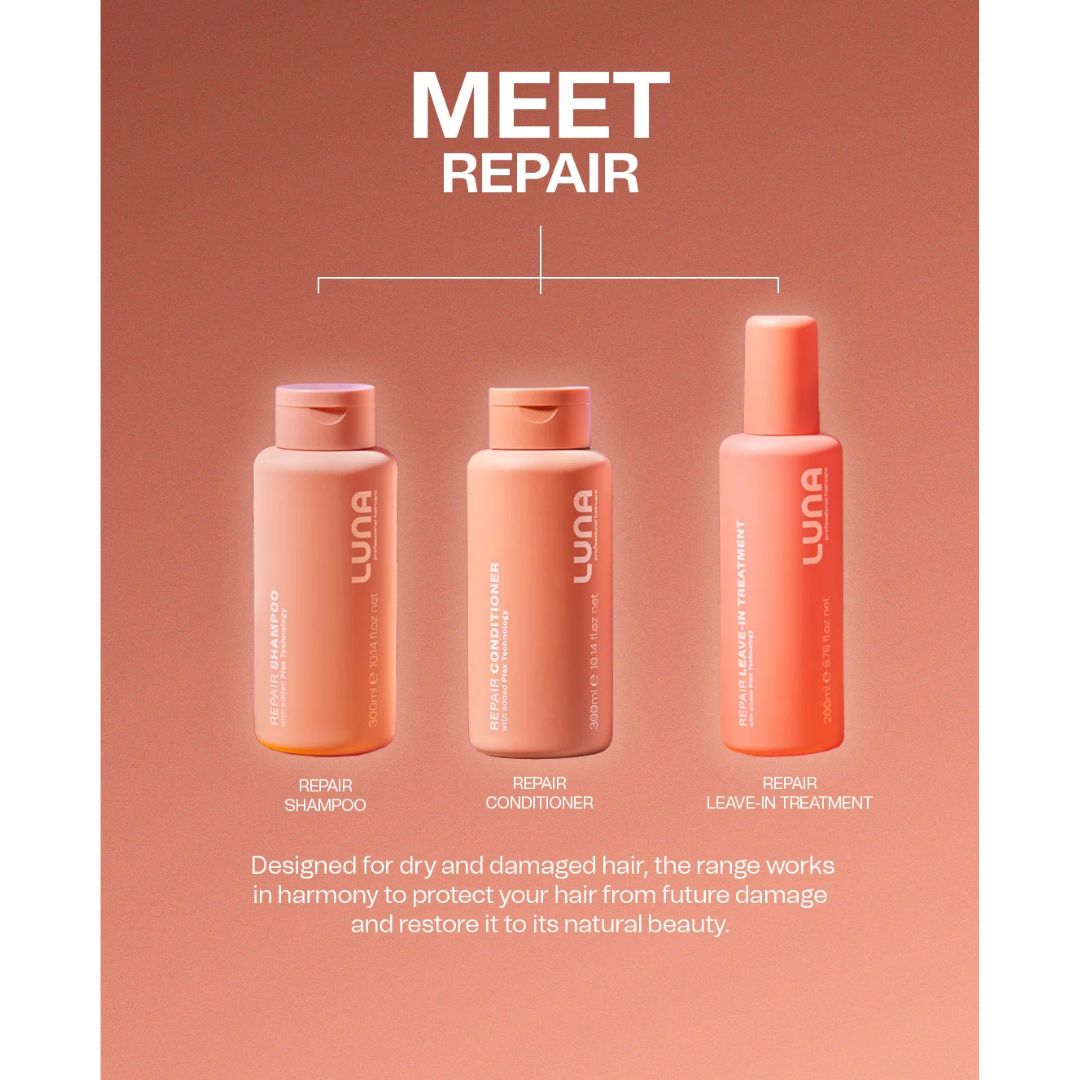 Three coral-pink hair care bottles from LUNA are shown on a matching coral background with the headline 'MEET REPAIR' and product labels for repair shampoo, repair conditioner, and leave-in treatment.