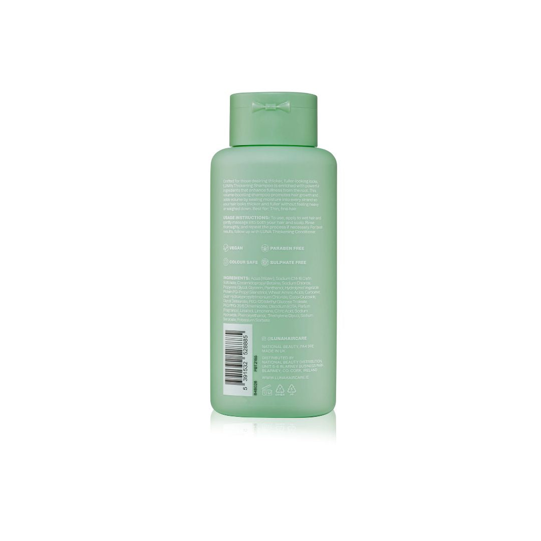 The back view of a translucent light green plastic bottle with a matching green flip-top cap, featuring white printed text and a barcode on a clean white background.