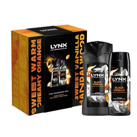 Lynx Fine Fragrance Collection 'Sweet Warm Creamy Orange' gift set, featuring a black and orange outer box alongside a large black bottle of body wash and a black bottle of body mist, both labeled 'Black Vanilla'.