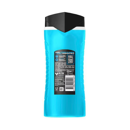 A 500ml bottle of Lynx Ice Chill Shower Gel 500ml
shown from the back. The bottle is bright cyan blue with a black and white geometric cap, and a black label with product details is affixed to the back.