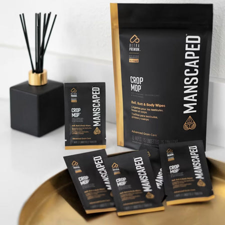Manscaped Crop Mop products on a tray with a diffuser in the background