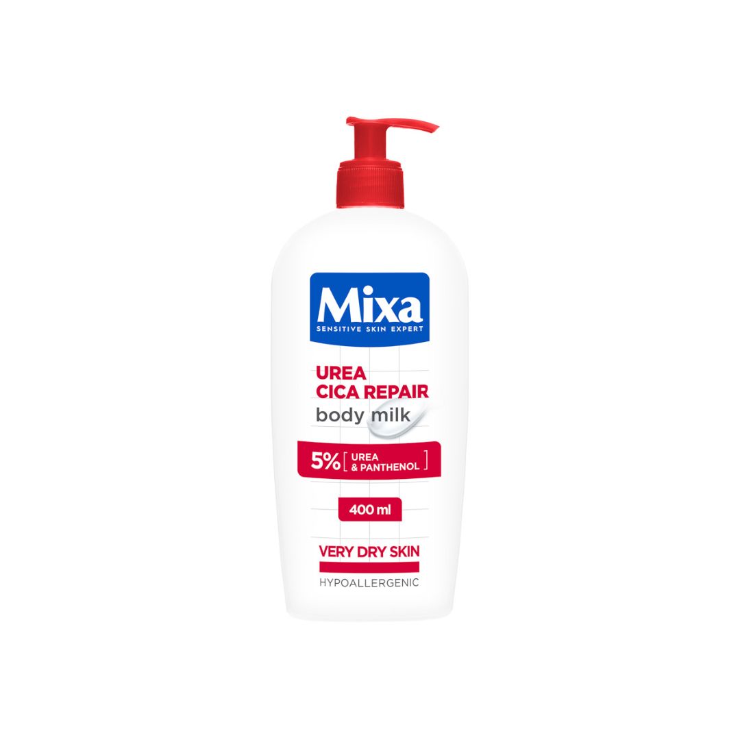 A 400 ml bottle of Mixa Urea Cica Repair Body Milk for very dry skin, featuring a white bottle with a red pump dispenser and a blue and red label.