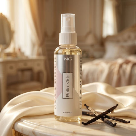 NG Bella Vida Body Spray 100ml on a marble table with bedroom background