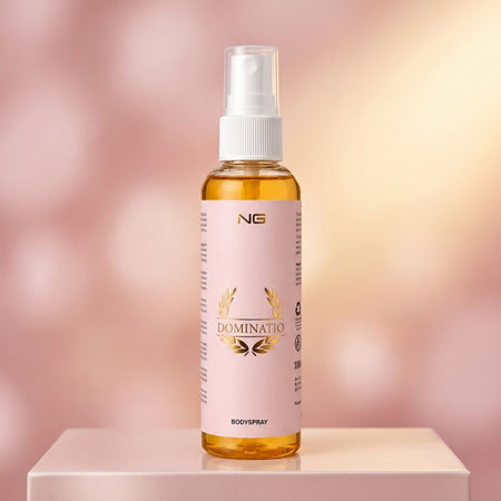 NG Dominatio Body Spray 100ml on a pink gradient background