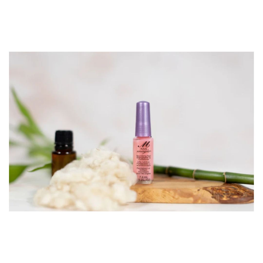 Nail Magic Nourish Nail Strengthener on a wooden countertop