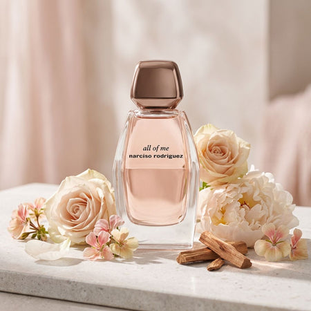 Narciso Rodriguez All of Me Eau de Parfum 50ml on a marble counter with flower petals
