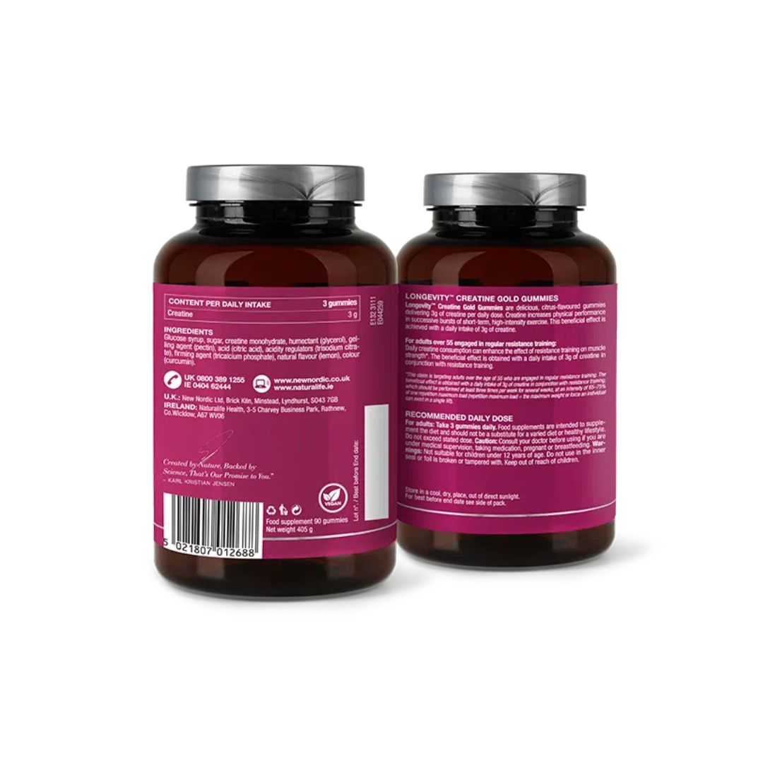 New Nordic Longevity Creatine Gold Gummies  - Two amber supplement bottles with dark magenta labels and silver caps, shown from the back on a white background.
