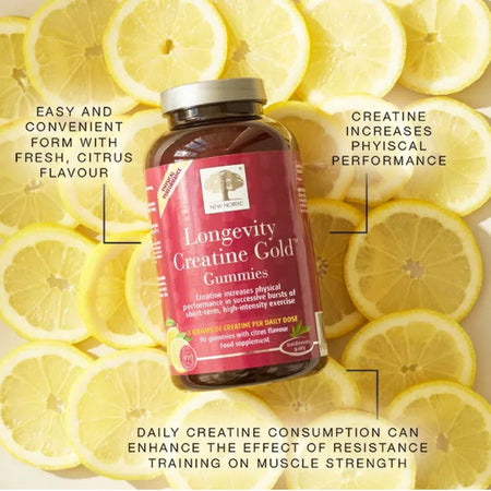 A bottle of Longevity Creatine Gold Gummies centered over a background of sliced yellow lemons, with promotional text callouts around it.