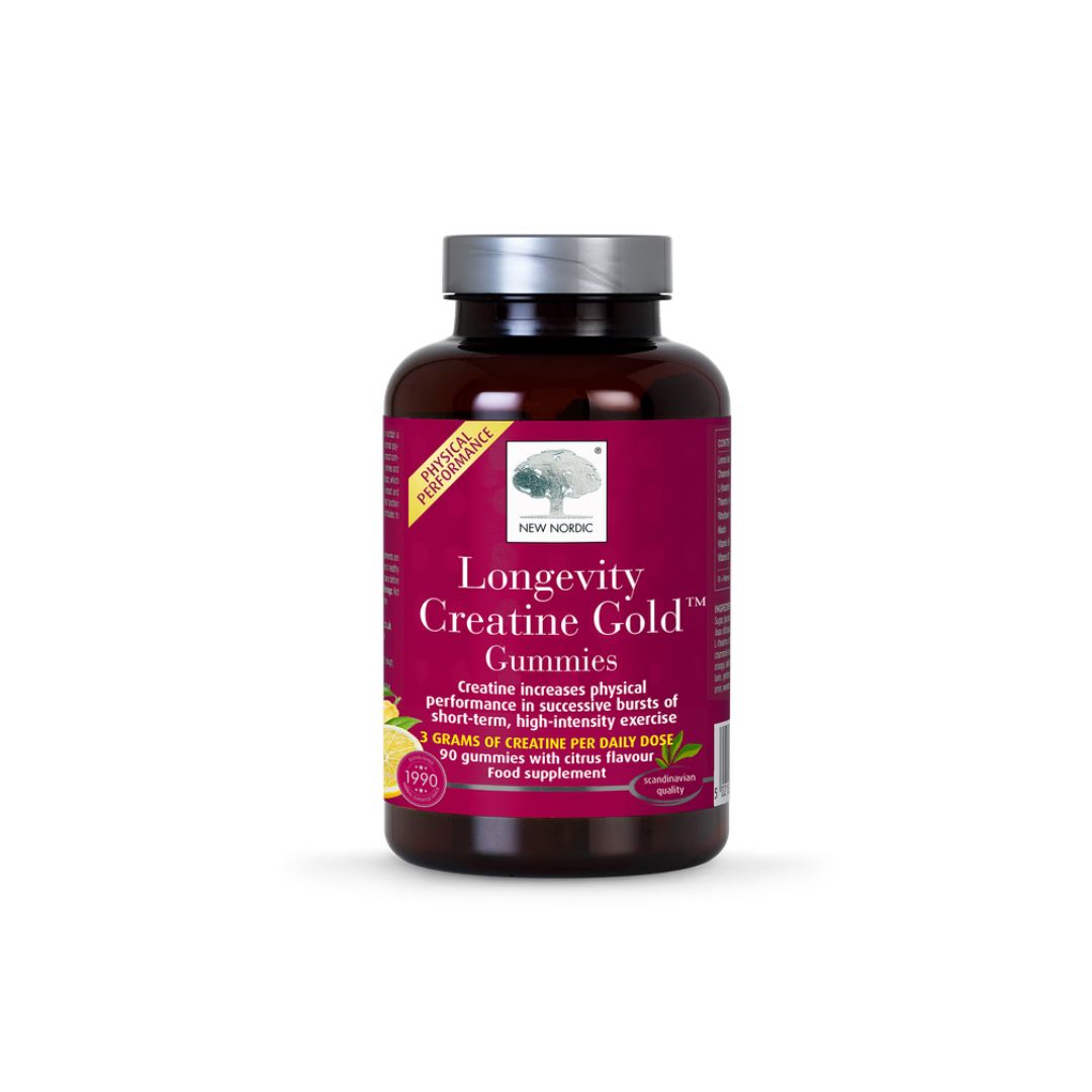 A bottle of New Nordic Longevity Creatine Gold Gummies on a clean white background. The product is in a dark amber brown bottle with a metallic silver cap and a deep magenta label featuring white and yellow text.