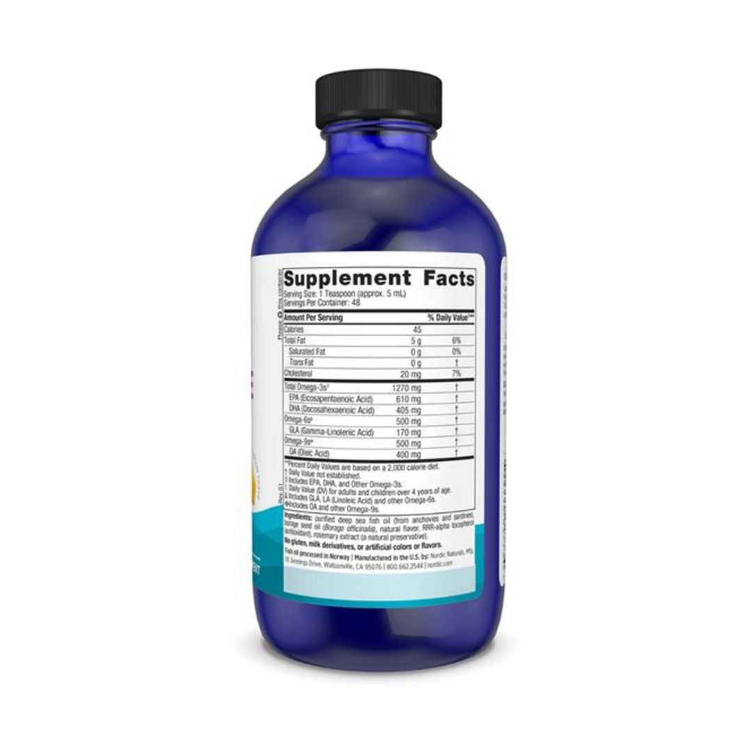 A blue plastic bottle of dietary supplements with a black cap, showing the Supplement Facts label on a white background.