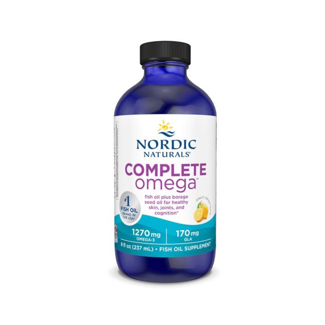 Nordic Naturals Complete Omega fish oil supplement in a blue bottle with a black cap, on a white background.