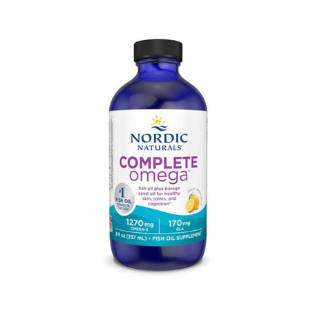 Nordic Naturals Complete Omega fish oil supplement in a blue bottle with a black cap, on a white background.