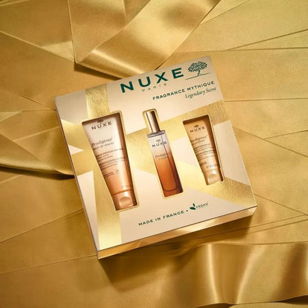 NUXE Paris Fragrance Mythique Gift Set on a golden background
