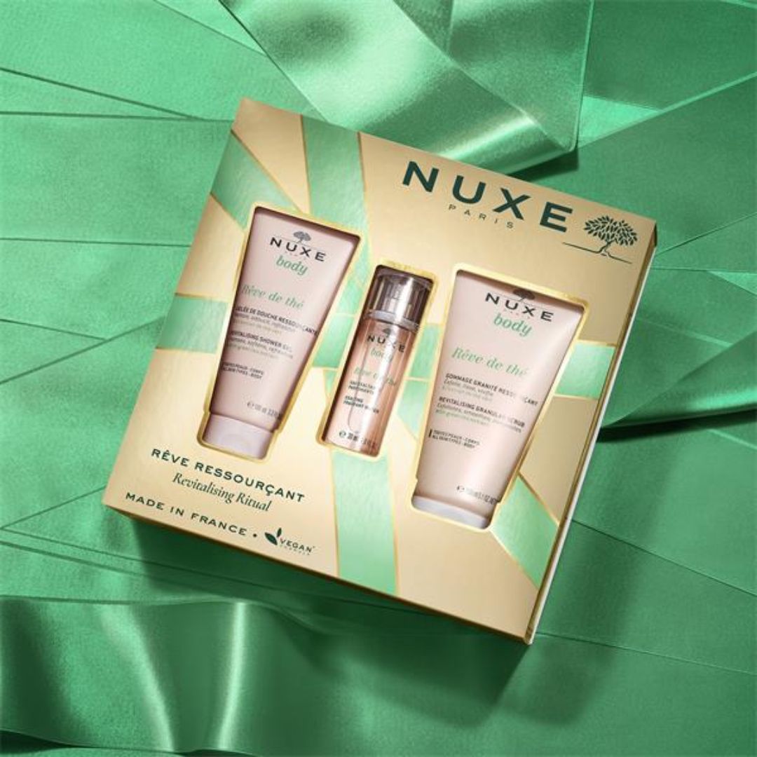 NUXE Paris Revitalising Ritual Gift Set on a green background
