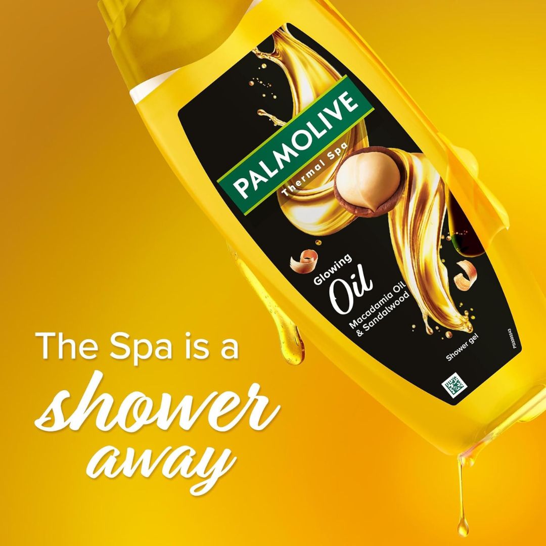 Palmolive Thermal Spa Glowing Oil Shower Gel 400ml on a yellow background 'The Spa is a shower away' graphic