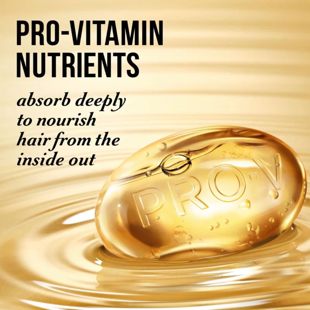 Gold capsule with 'PRO-V' branding on a liquid background, promoting pro-vitamin nutrients for hair health.