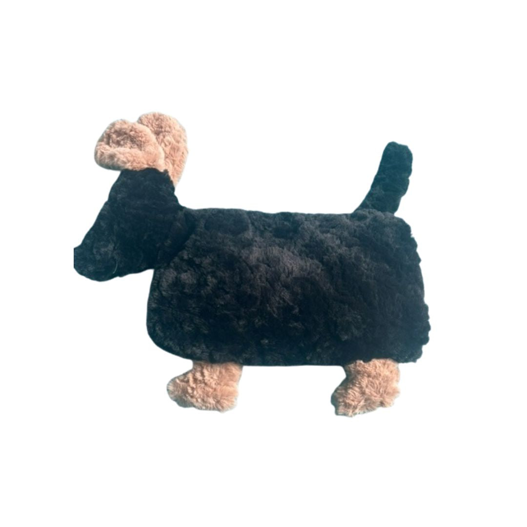 A plush dog-shaped hot water bottle in black with tan accents on the ears, paws, and tail, shown against a plain white background.