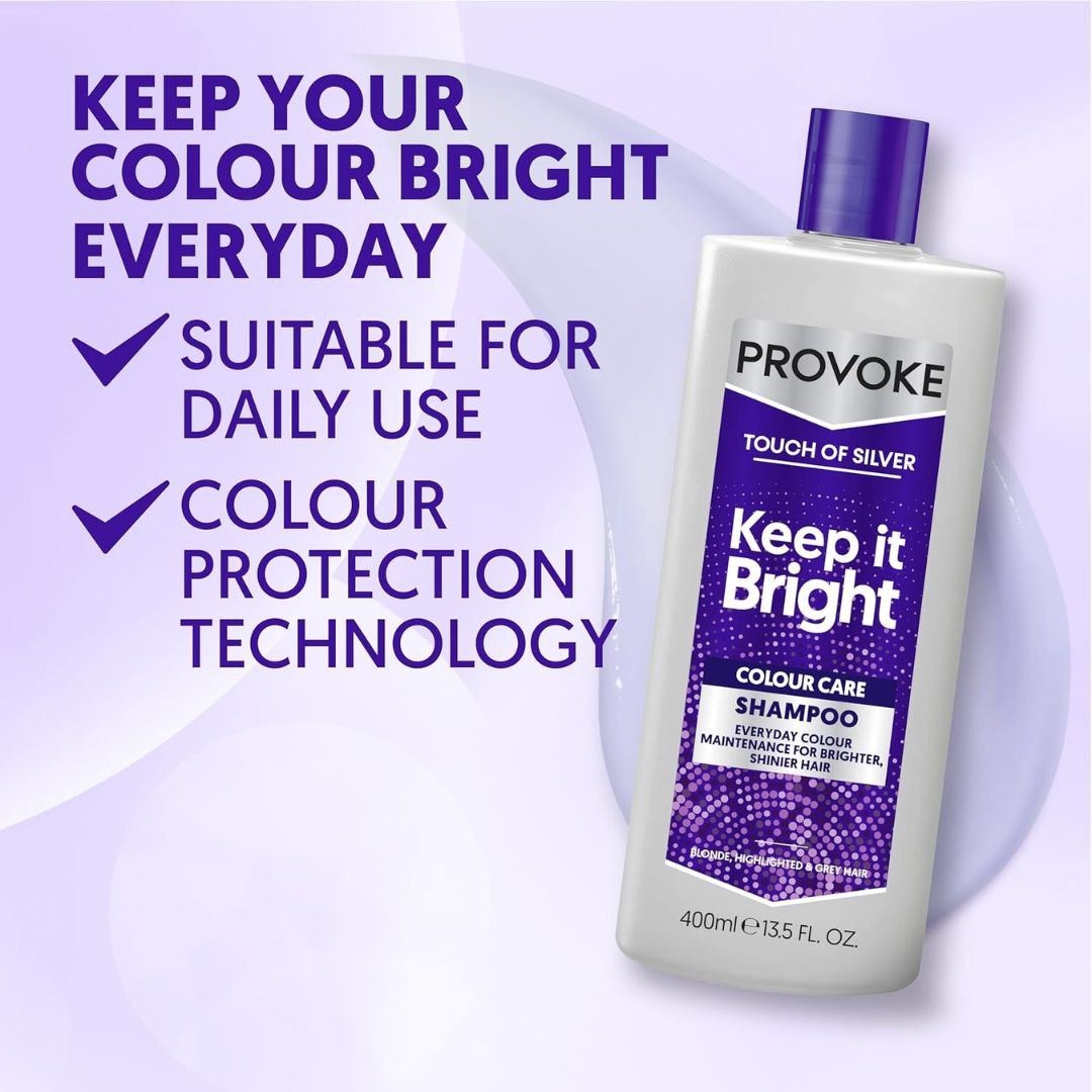 A bottle of Provoke Touch of Silver Keep it Bright Colour Care Shampoo on a light purple background with promotional text on the left.