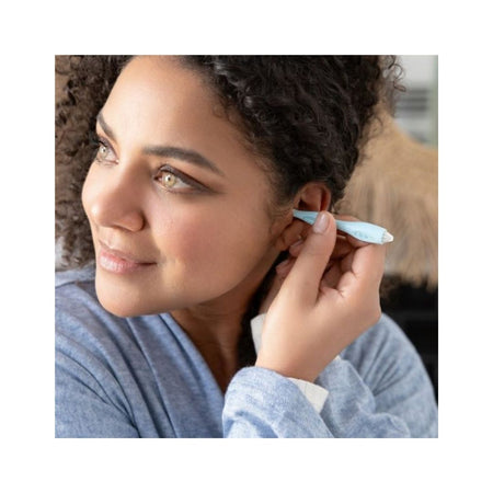 Quies Soft Ear Cleaner being used by a woman