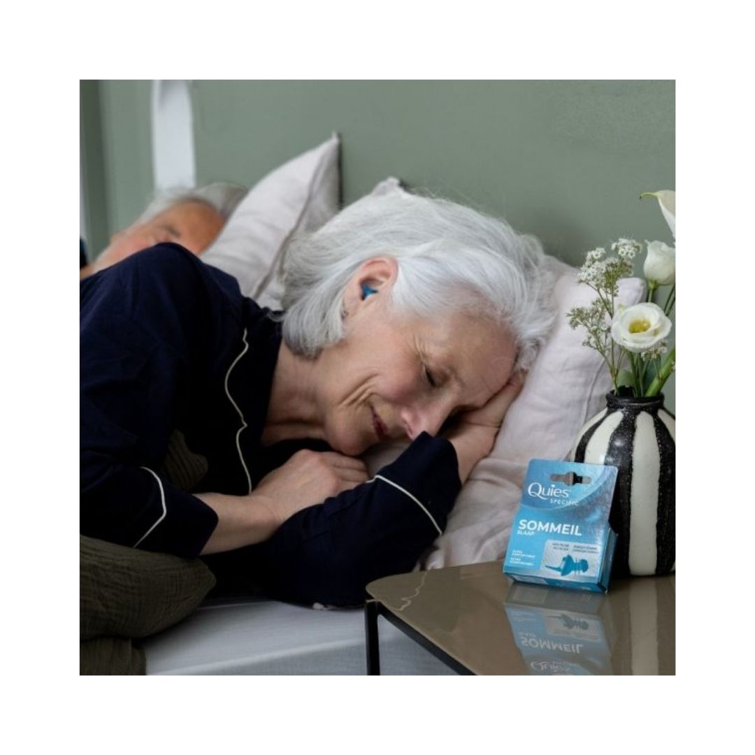 Quies Specific Sleep Ear Plugs on a night stand 