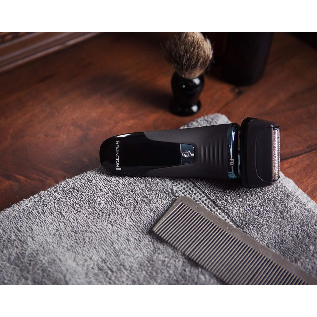 Remington Ultimate Series F8 Foil Shaver on a carpet 