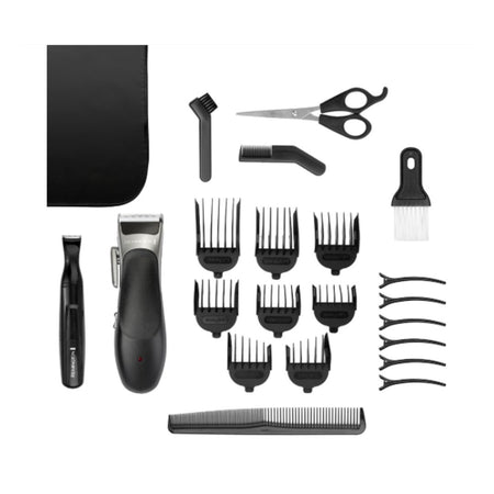 A hair trimmer kit laid out on a white background, including a black and silver trimmer, a black cordless trimmer, multiple black guide combs, scissors, a brush, a comb, and several hair clips.