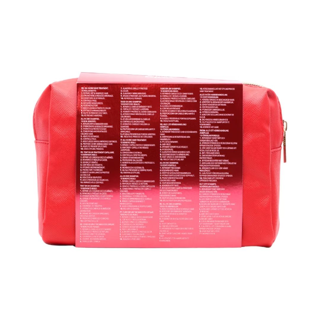 A red cosmetic pouch with a glossy gradient finish and a large white text panel on the front, photographed against a plain white background.