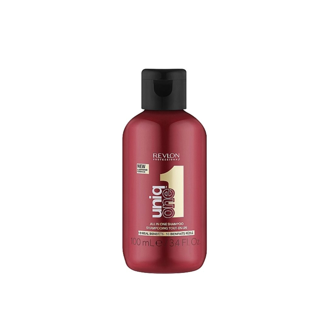 A 100 mL bottle of Revlon Uniglide 1 All-In-One Shampoo, featuring a metallic deep red bottle and a black flip-top cap, set against a plain white background.