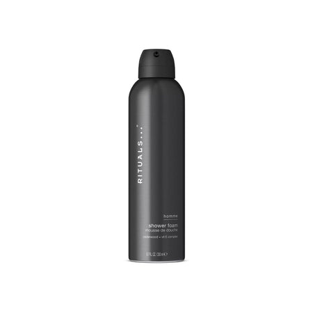 A matte black aerosol can of Rituals Humans shower foam on a clean white background.