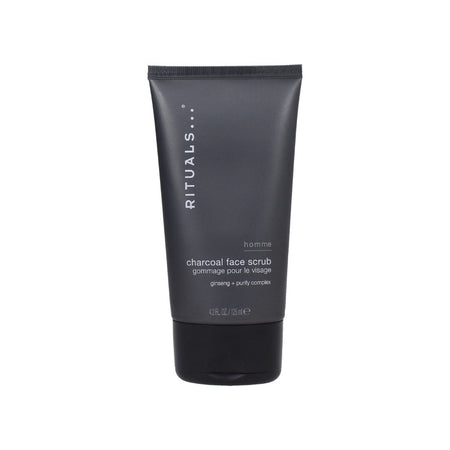 A black squeeze tube of RITUALS... Homme Charcoal Face Scrub on a solid white background.