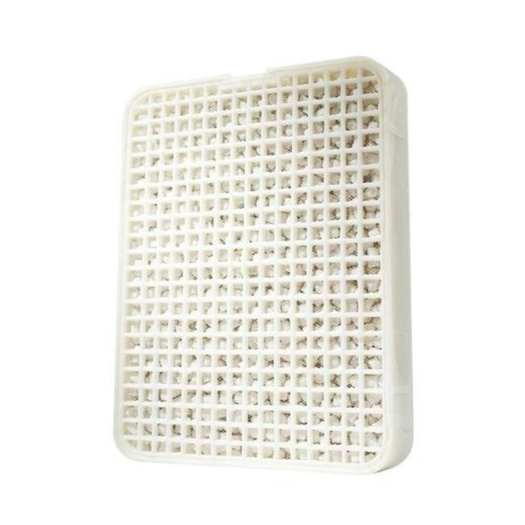 Rectangular white plastic salt filter component with grid pattern on a white background
