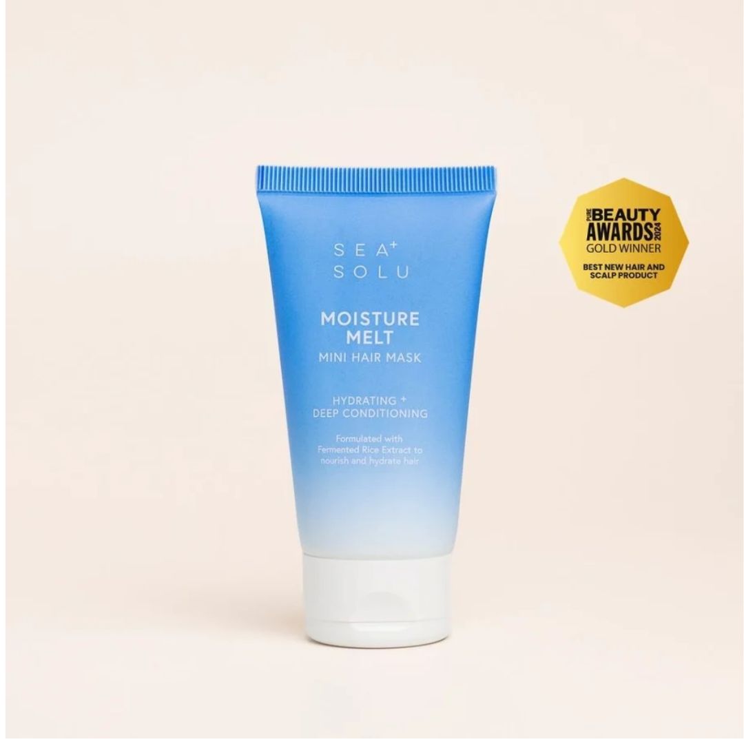 SEA SOLU Moisture Melt Mini Hair Mask in a blue gradient squeeze tube with a white cap, shown on a light beige background with a gold 'Beauty Awards Gold Winner' badge.