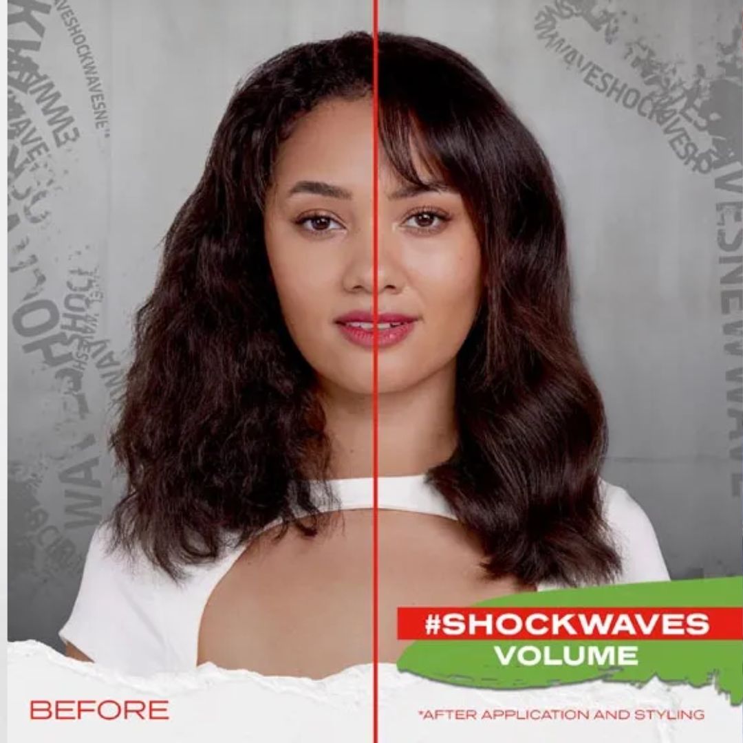 A woman with dark brown wavy hair shown in a before-and-after split comparison. The right side is labeled '#SHOCKWAVES VOLUME' and appears fuller and more voluminous than the left side labeled 'BEFORE'.