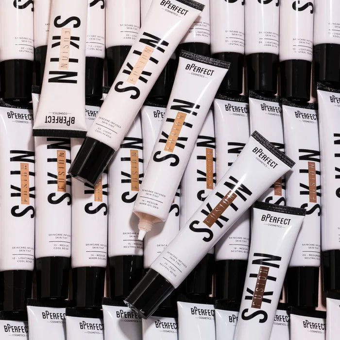 Multiple tubes of BPerfec SkinN skin illuminator cream on a white background