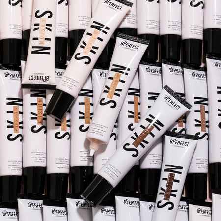 Multiple tubes of BPerfec SkinN skin illuminator cream on a white background