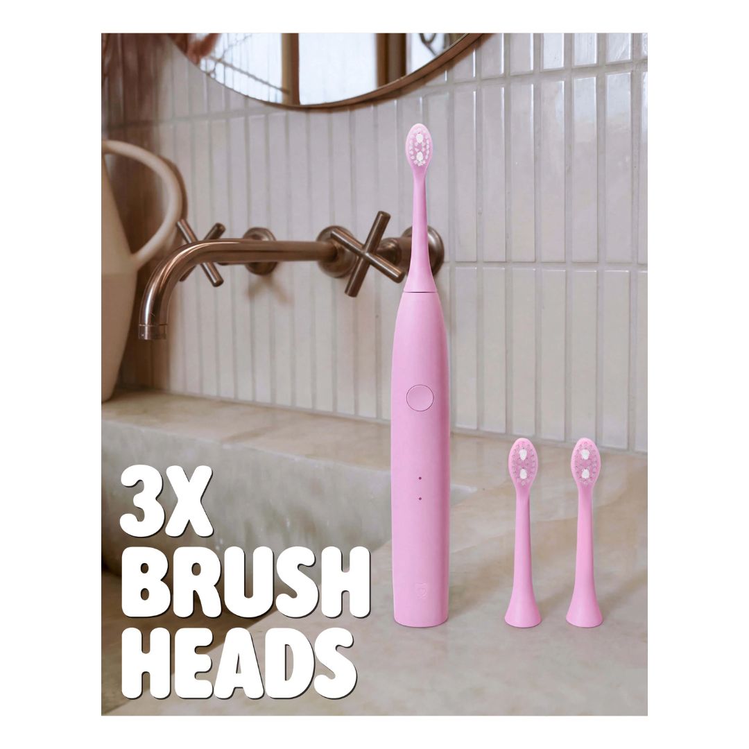 Spotlight Oral Care Sonic One Electric Toothbrush – Pink '3X BRUSH HEADS' graphic on a tiled bathroom background
