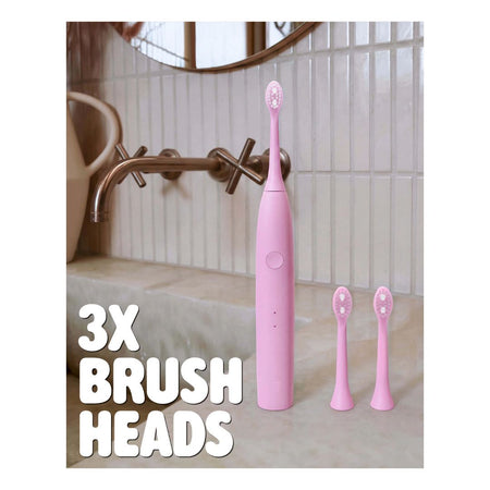 Spotlight Oral Care Sonic One Electric Toothbrush – Pink '3X BRUSH HEADS' graphic on a tiled bathroom background