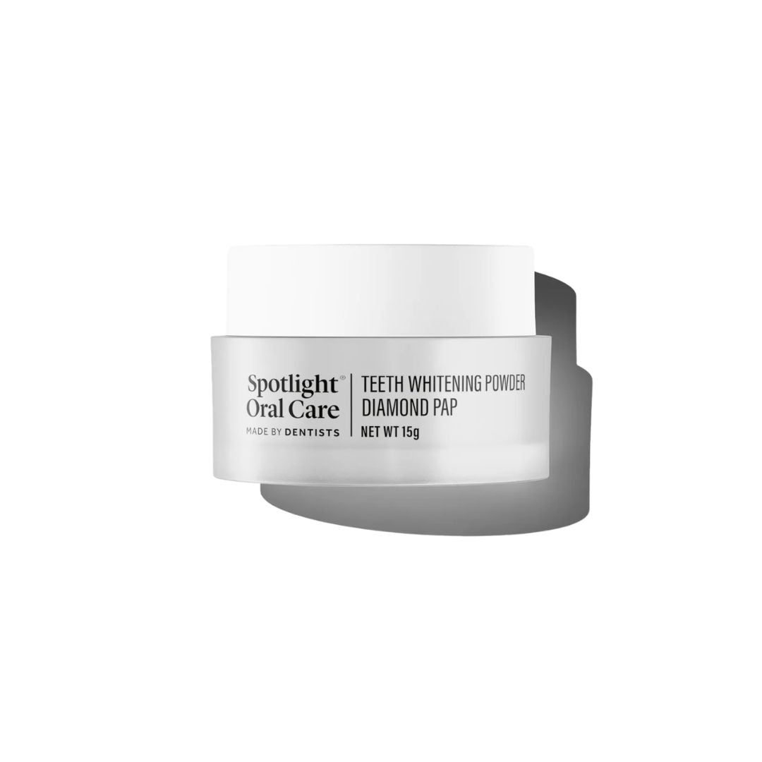 A white cosmetic jar of Spotlight Oral Care Teeth Whitening Powder Diamond Pap on a clean white background with a soft gray shadow.