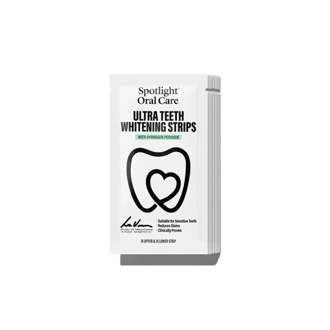A pack of Spotlight Oral Care Ultra Teeth Whitening Strips shown on a clean white background. The packaging is white with black text and a black tooth outline graphic.