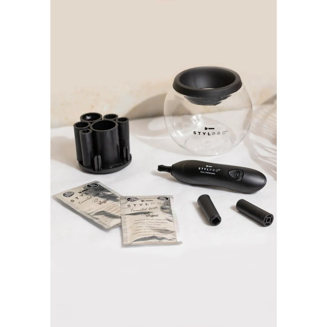 STYLPRO Original Makeup Brush Cleaner and Dryer contents on an off white background