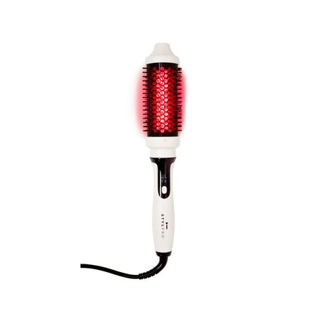 A white and black round hot air brush with a glowing red LED light pattern on the barrel, shown against a solid white background. Stylpro ballyduff