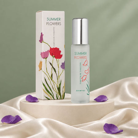Milton Lloyd Summer Flowers Parfum de Toilette on a podium surrounded my satin and petals