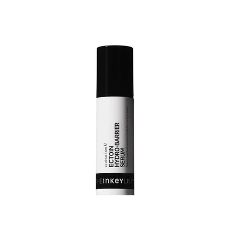 A single tube of HeInkey List Ectoin Hydro-BARRIER Serum, featuring a white body with black text and a black cap, centered on a plain white background.