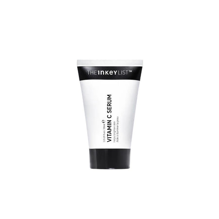 A white squeeze tube of The Inkey List Vitamin C Serum with black caps and text, centered on a plain white background.