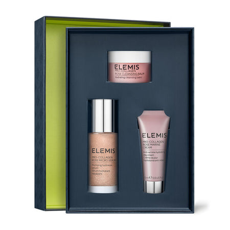 Elemis skincare product set in a box with three items: cream, balm, and serum.